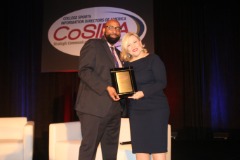 Presenting Holly Rowe with her Jake Wade award at the 2019 convention.